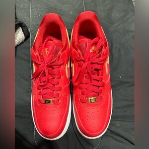 Red and Gold Nike air force 1’s